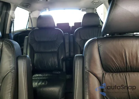 2010 Honda Odyssey Touring z USA, uszkodzony, nr VIN 5FNRL3H96AB067417